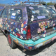 Illustration for article titled Groovalicious Purple Princess Of Peace Art Car Falls On Hard Times, Faces Crusher